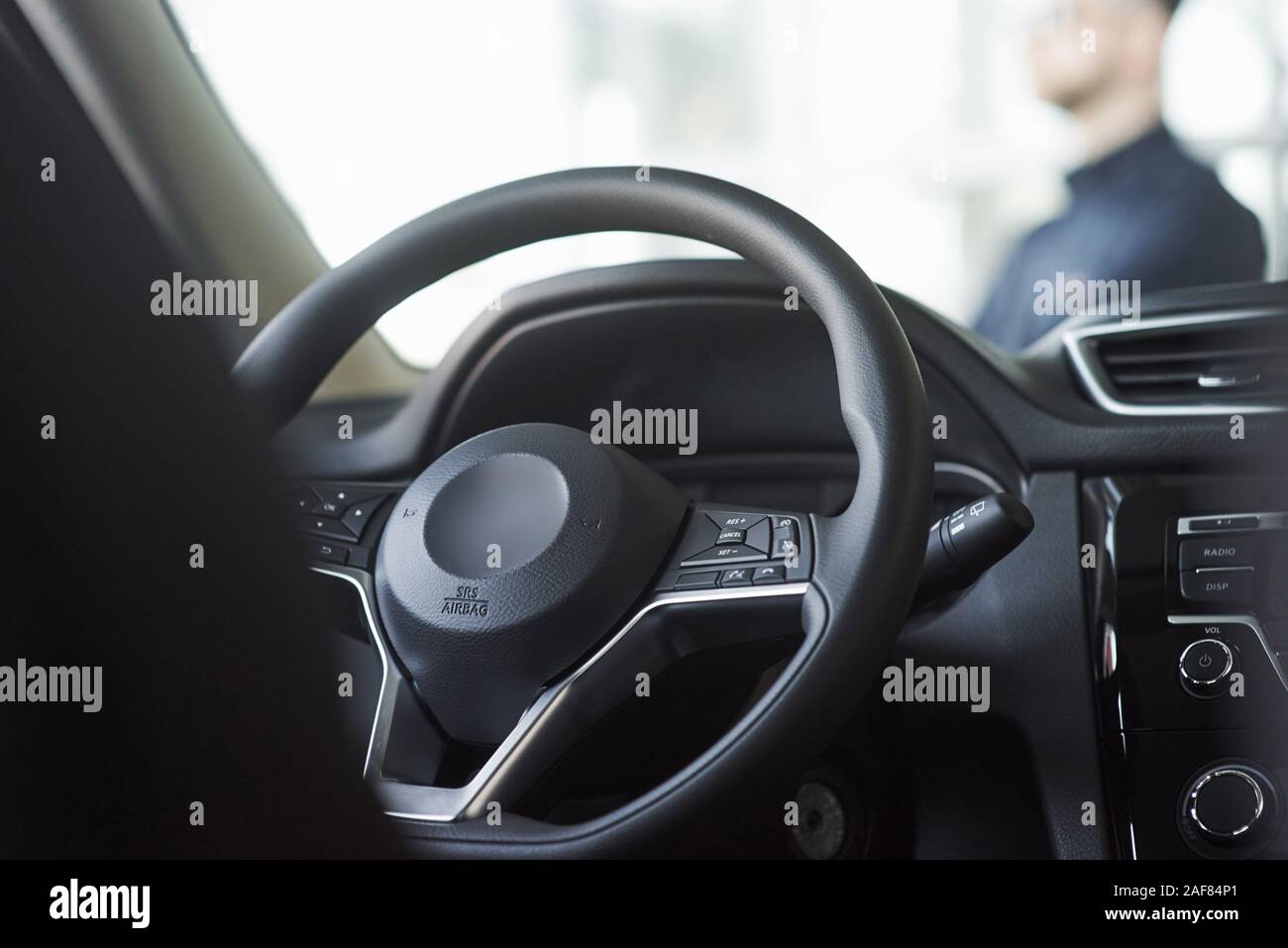 Young guy standing in front of car hi-res stock photography and images ...