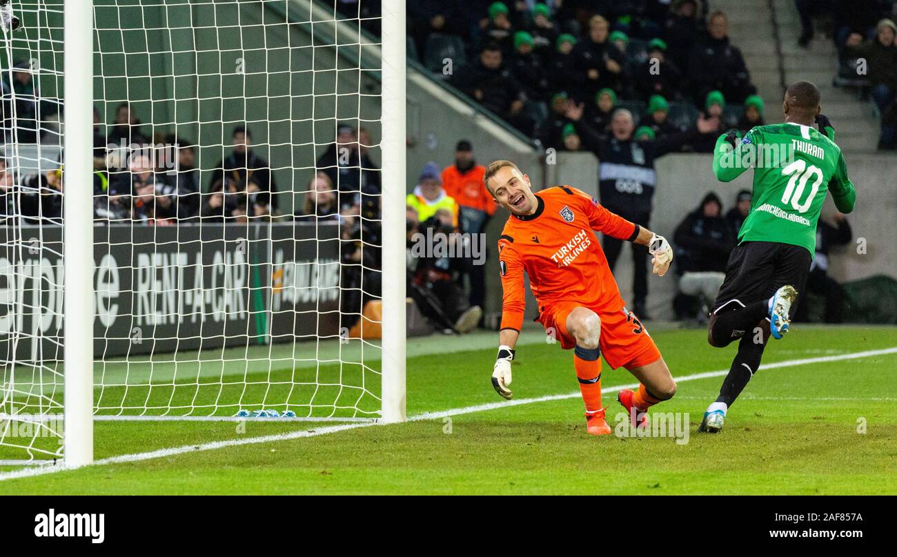 sports, football, UEFA Europe League, 2019/2020, Group Stage, Group J, Matchday 6, Borussia Moenchengladbach vs. Istanbul Basaksehir FK 1-2, Stadium Borussia Park, scene of the match, 1-0 goal to Gladbach, left keeper Mert Guenok (Bas), right goal scorer Marcus Thuram (MG) Stock Photo