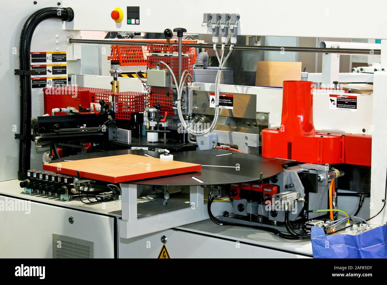 Automatic woodworking machine for processing veneer boards Stock Photo