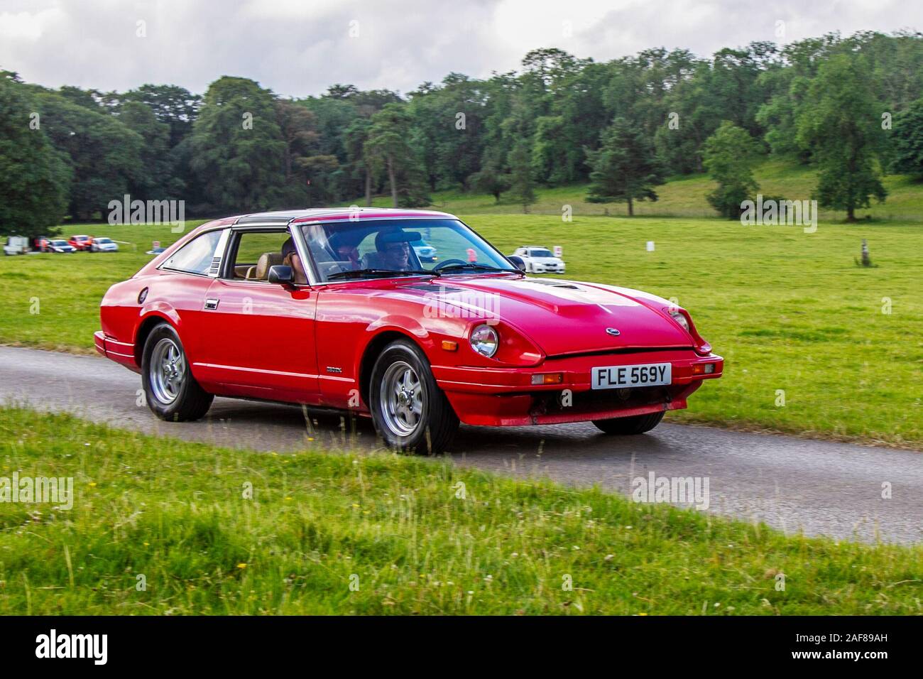 1983 80s red Datsun 280 ZX; Classic cars, historic, cherished, old timers, collectable restored vintage veteran, heritage vehicles of yesteryear arriving for the Mark Woodward historical motoring event at Leighton Hall, Carnforth, UK Stock Photo