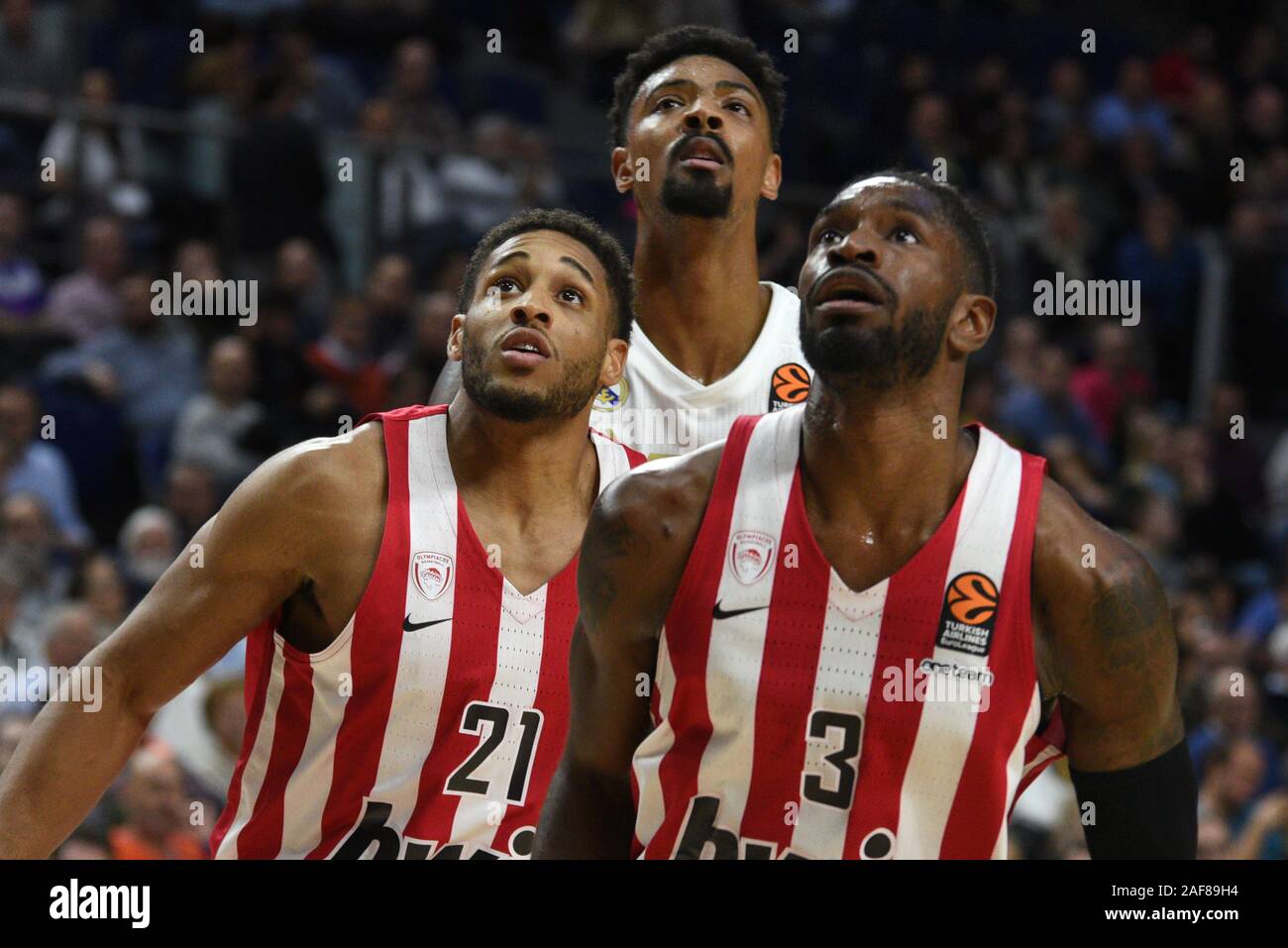 Madrid, Spain. 12th Dec, 2019. Brandon Paul (R) #3 of Olympiacos, Jordan  Mickey (C), #25 of Real Madrid and Rubit Augustine, #16 of Olympiacos seen  during the 2019/2020 Turkish Airlines EuroLeague Regular