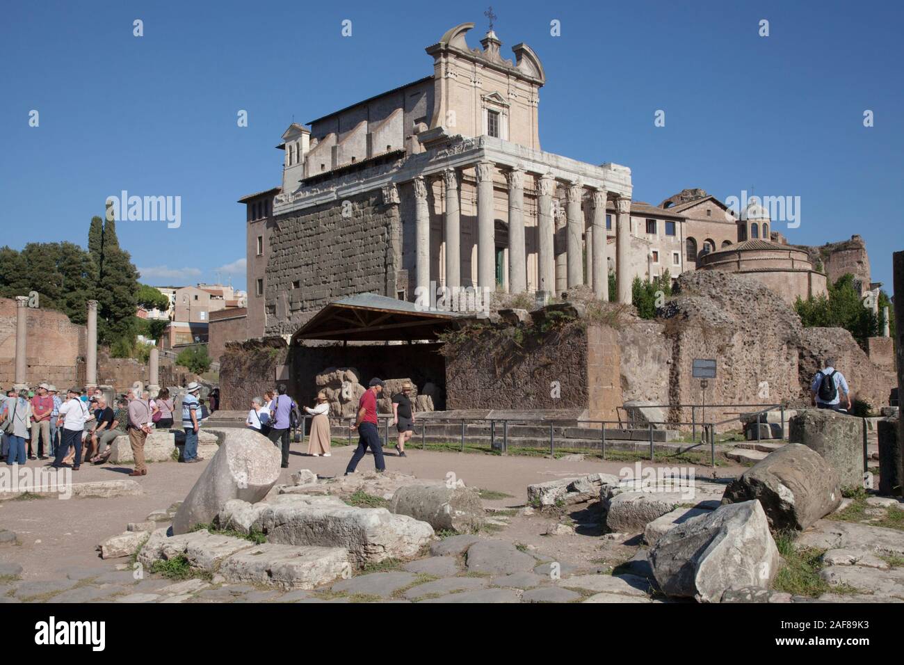 The Roman Forum is a forum (plaza) surrounded by the ruins of several government buildings and a tourist hotspot Stock Photo