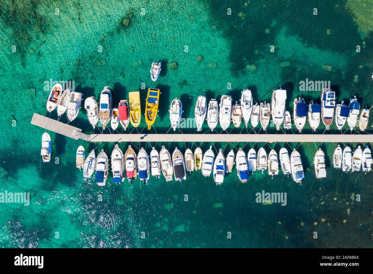 Aerial overhead view of yachts in marina in town of Vodice, Adriatic sea in Croatia Stock Photo