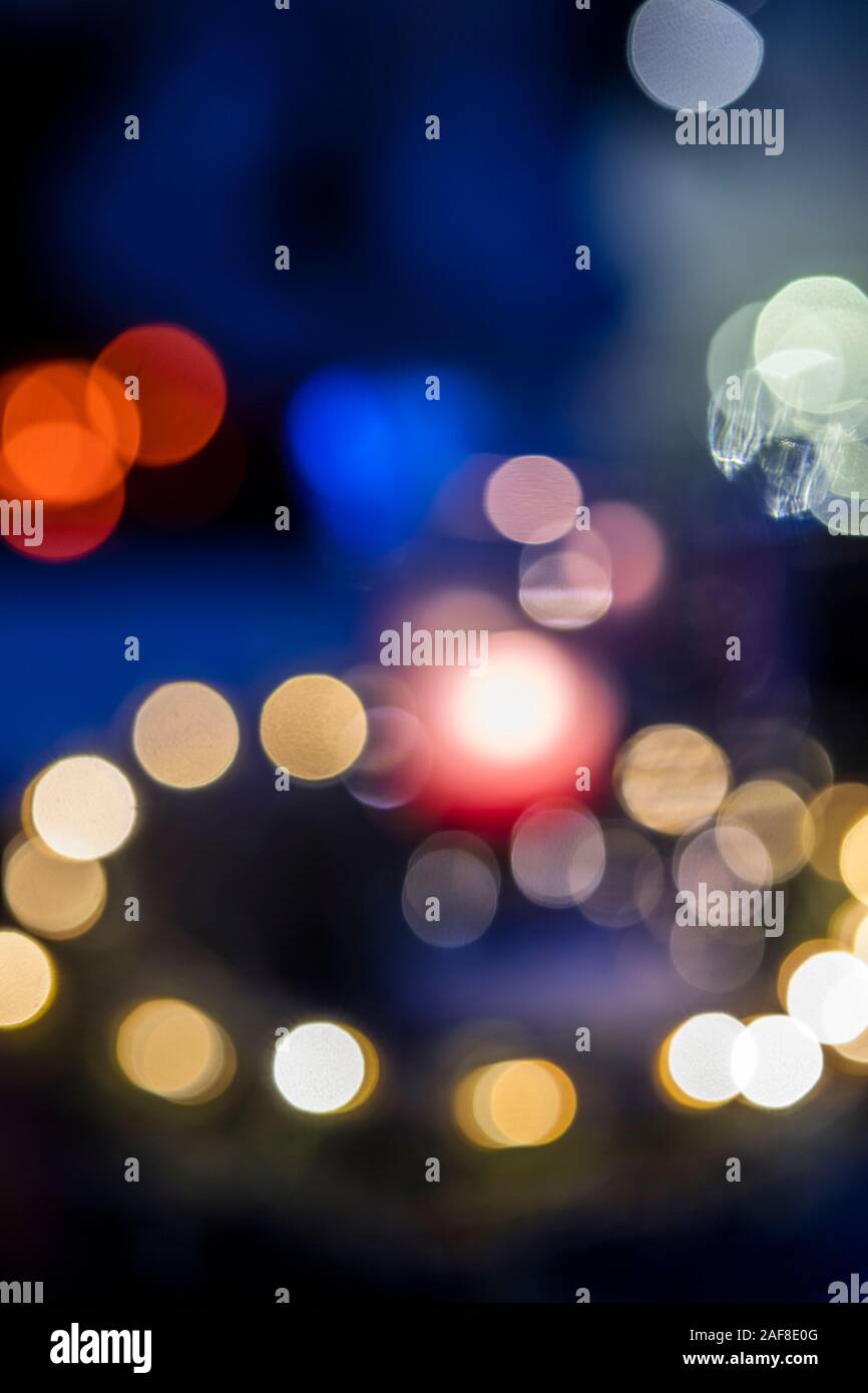 Bokeh created by blurred Christmas lights Stock Photo