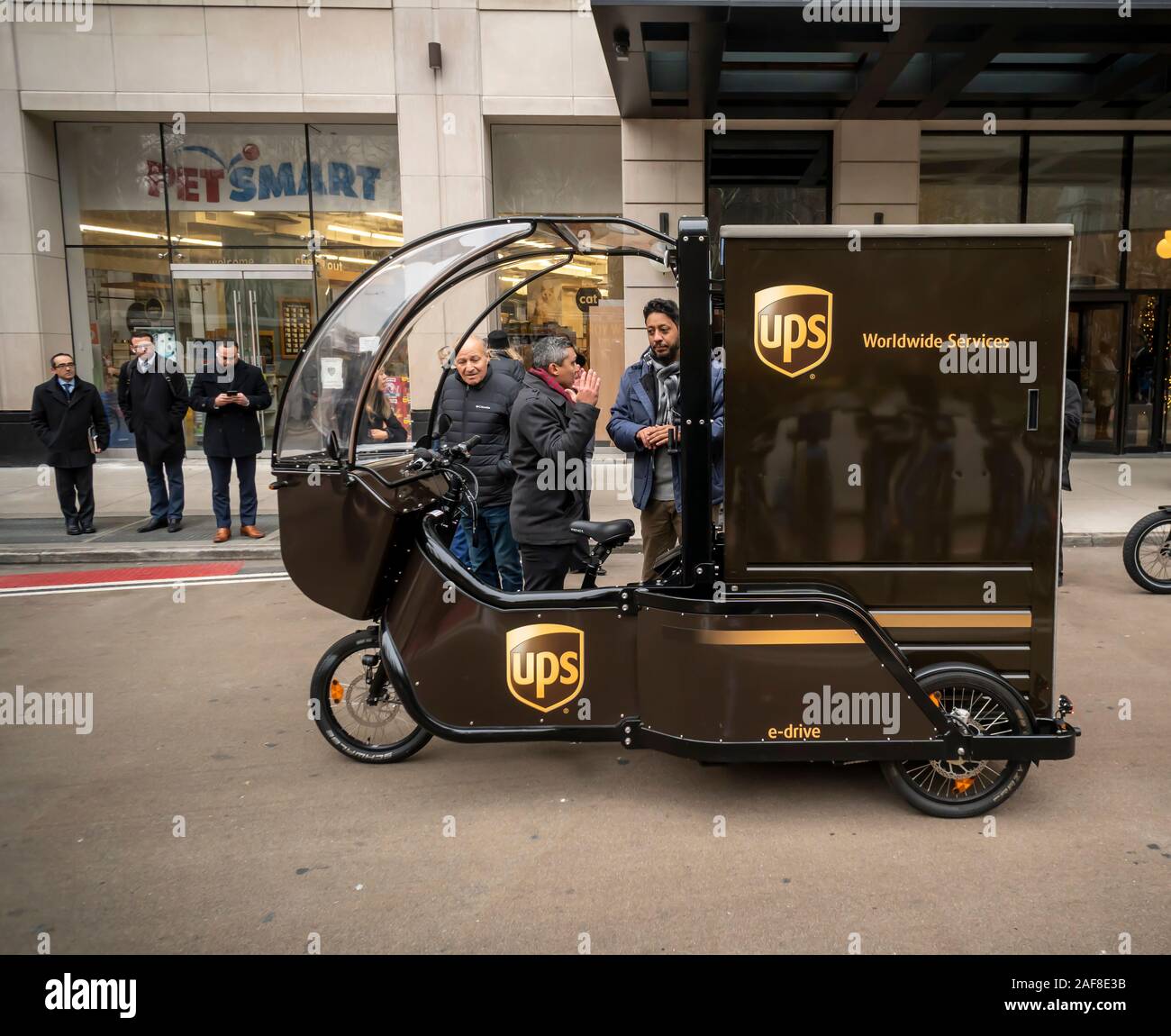 Both UPS branded and Amazon cargo bikes are demonstrated at a media event  in the Flatiron neighborhood of New York on Wednesday, December 4, 2019.  The program, which also involves DHL, is