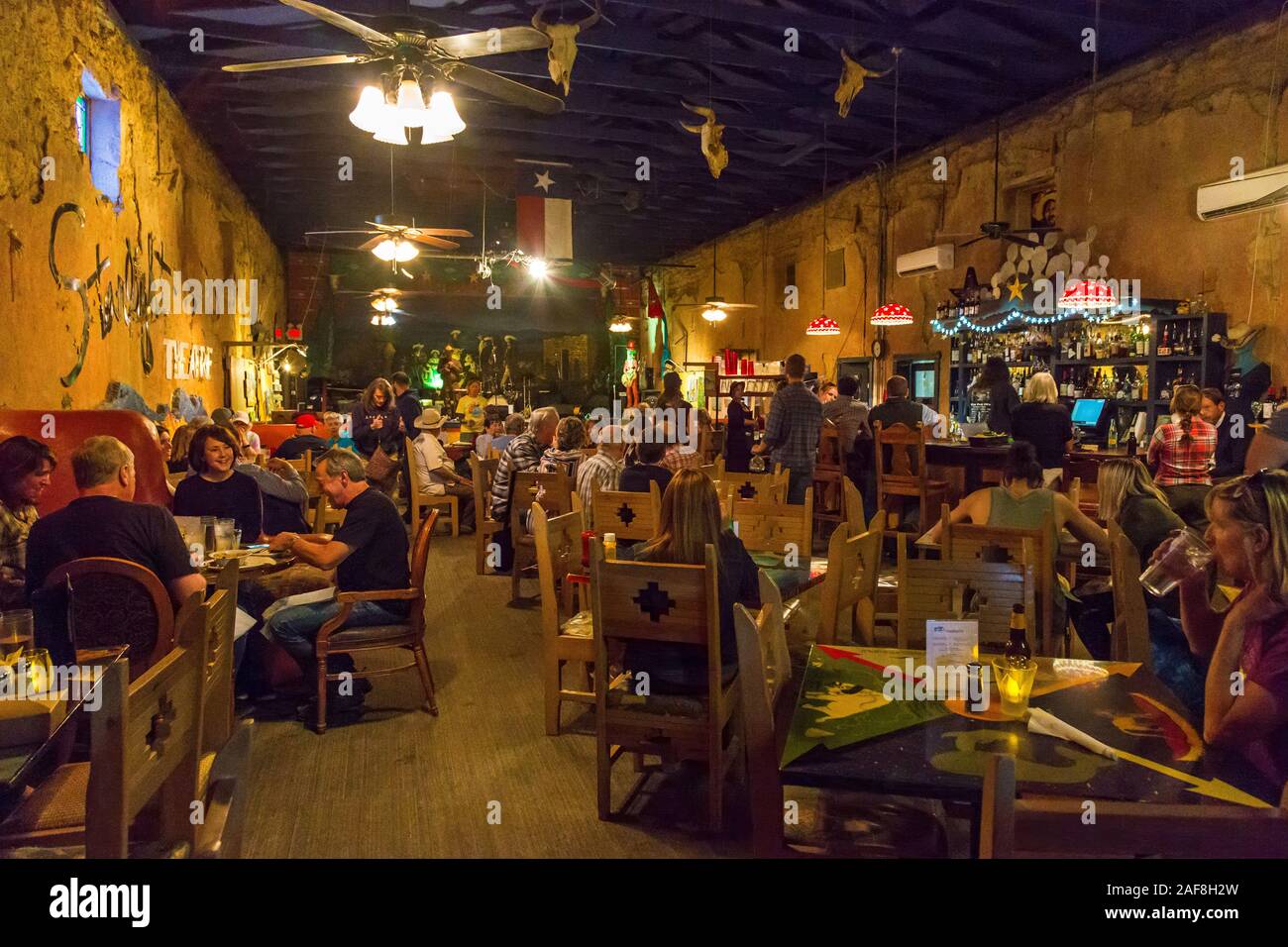 Terlingua, Texas.  Patrons at Terlingua Theater, Restaurant, and Bar. Stock Photo