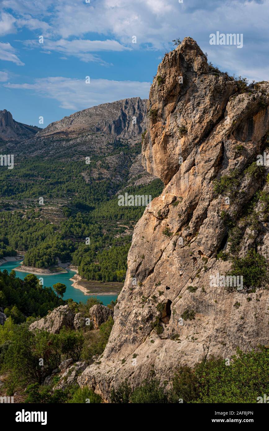 Climbing walls at Guadalest a small town near the Costa Blanca coastline with azure reservoir lake in the mountains, Guadalest, Costa Blanca, Alicante Stock Photo