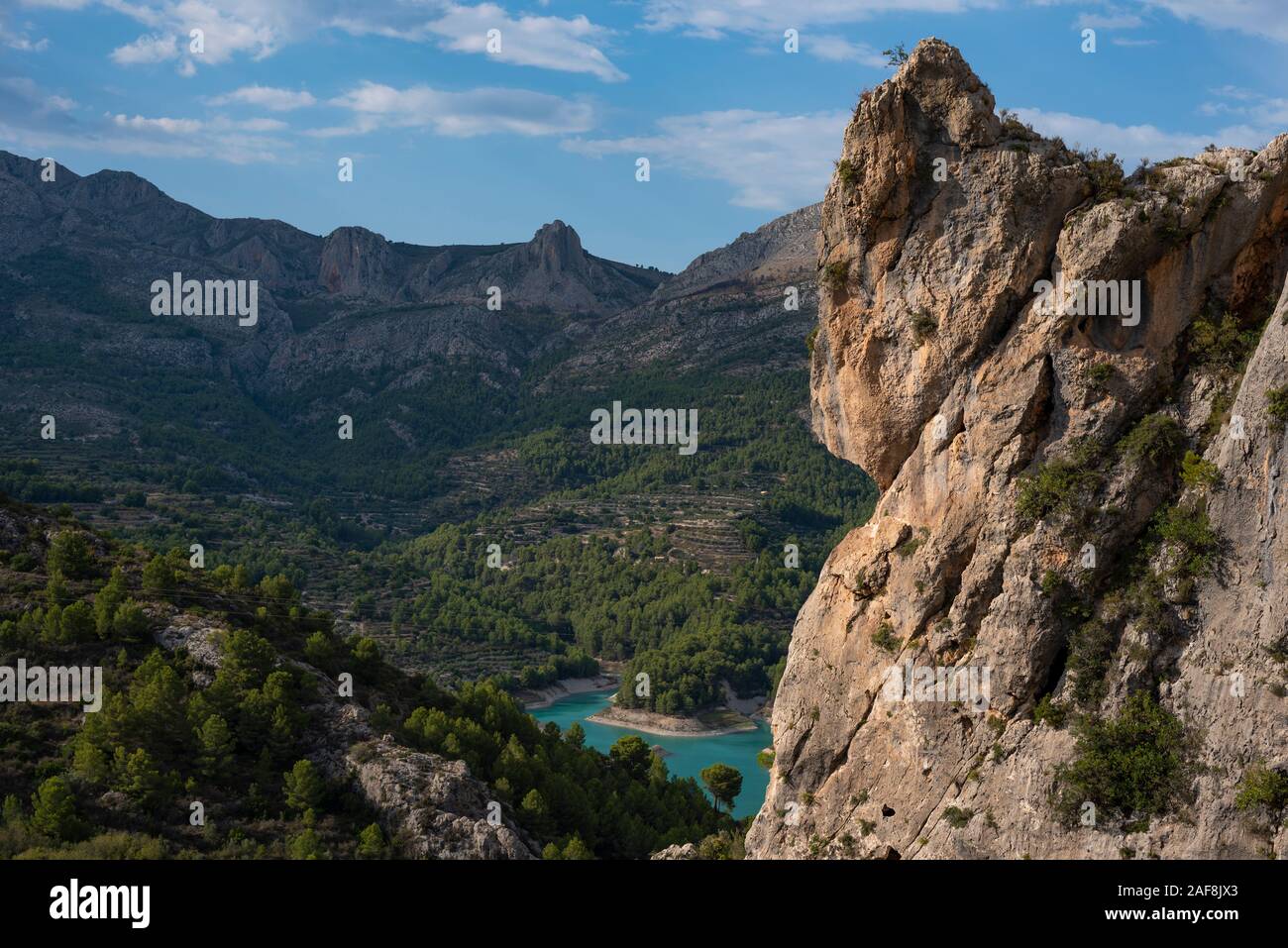 Climbing walls at Guadalest a small town near the Costa Blanca coastline with azure reservoir lake in the mountains, Guadalest, Costa Blanca, Alicante Stock Photo