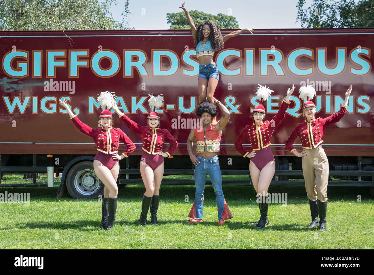 dayana iovany middle pose with the front of house girls giffords circus present new show xanadu at chiswick house and gardens london 2AF8NYD