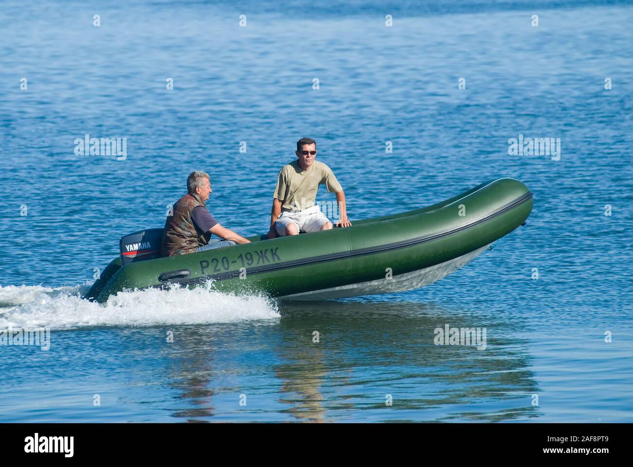 Raft with outboard motor hires stock photography and images Alamy