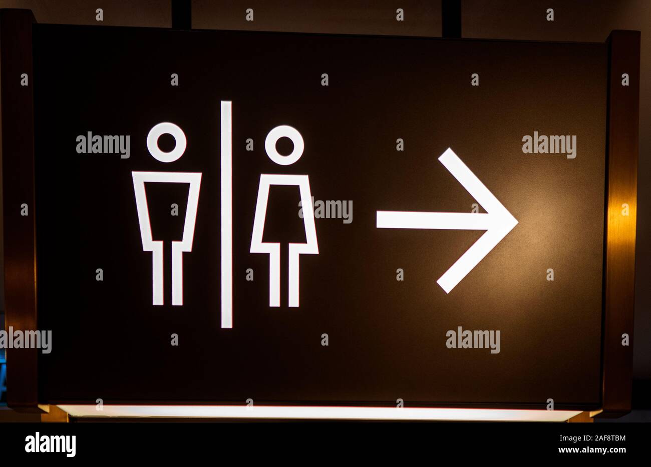 Toilet guide sign white and black business commercial building Stock