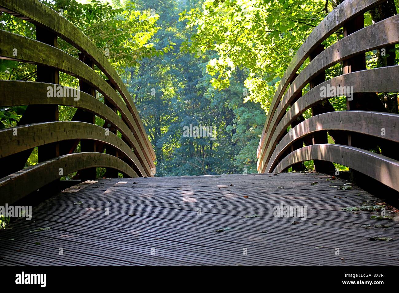 Close up front view of a wooden Bridge with focus on foreground Stock Photo