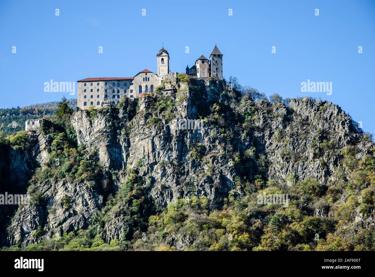 The Benedictine Abbey on Mt. Säben near Klausen is a popular landmark in South Tyrol and lies high above Eisacktal valley. Stock Photo