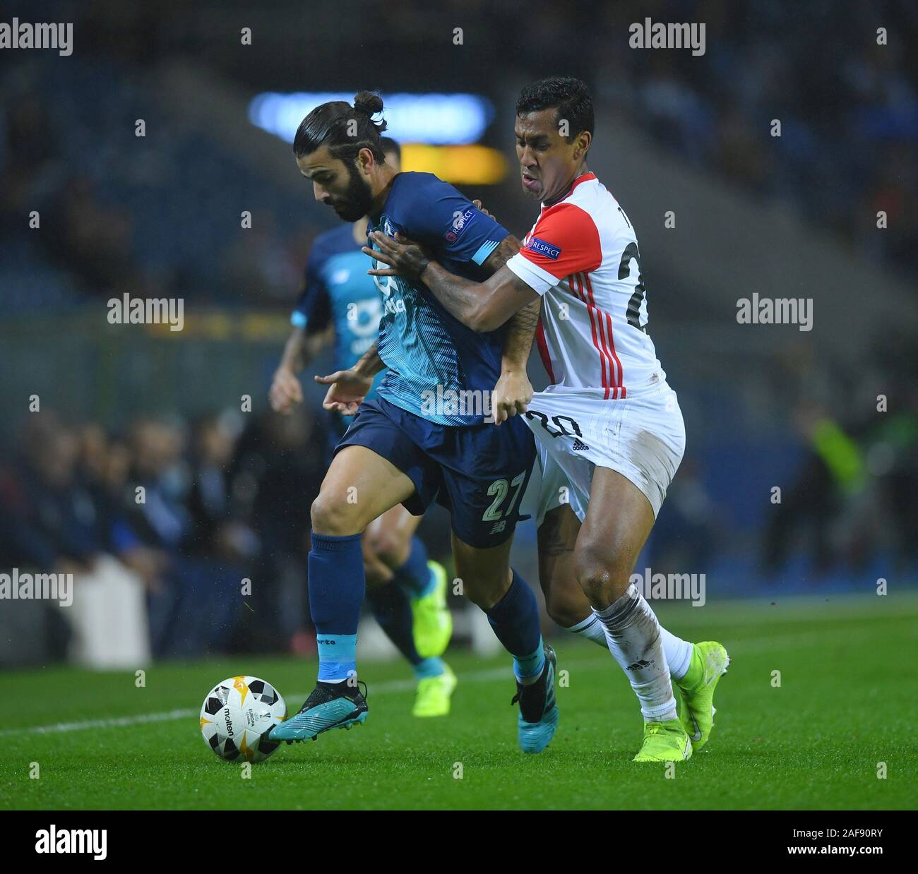 Dragao Stadium, Porto, Portugal. 12th Dec, 2019. UEFA Europa League football, FC Porto versus Feyenoord; Sérgio Oliveira of FC Porto and Renato Tapia of Feyenoord tussle for the ball along the wing - Editorial Use Credit: Action Plus Sports/Alamy Live News Stock Photo