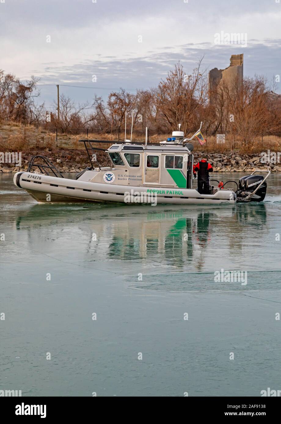 Detroit, Michigan - A U.S. Border Patrol boat cuts through ice on Conners Creek on its way to patrol the Detroit River between the United States and C Stock Photo