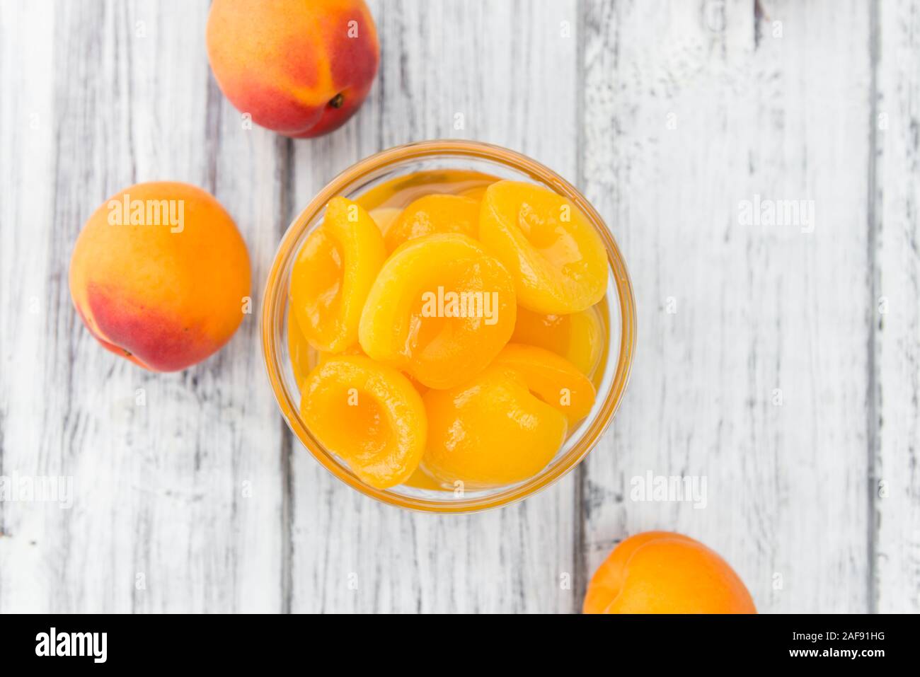 Pickled Apricots on a vintage background as detailed close-up shot