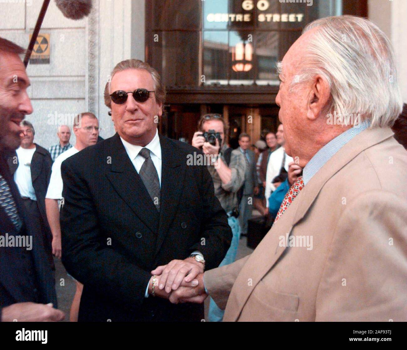 June 5, 2001 - Manhattan, NEW YORK - Anthony Quinn greeted by actor Danny Aiello outside of State Supreme Court.  Danny Aiello  happen to be their making a film today 8.18.97.(Credit Image: © Globe Photos/ZUMAPRESS.com) Stock Photo