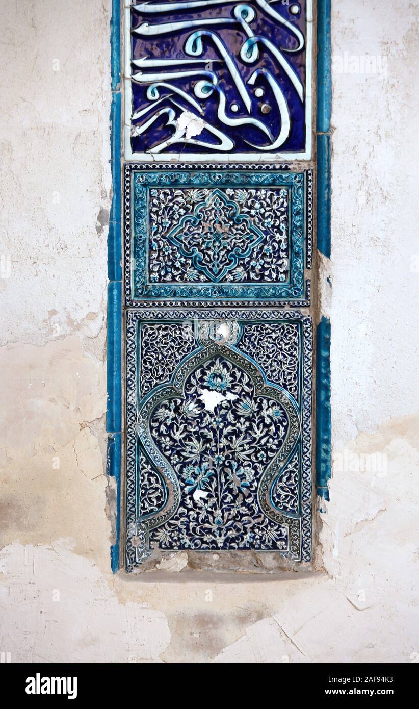 Ancient tilework on the Mausoleum of Nadzhimetdin Kubra at Kunya Urgench Stock Photo