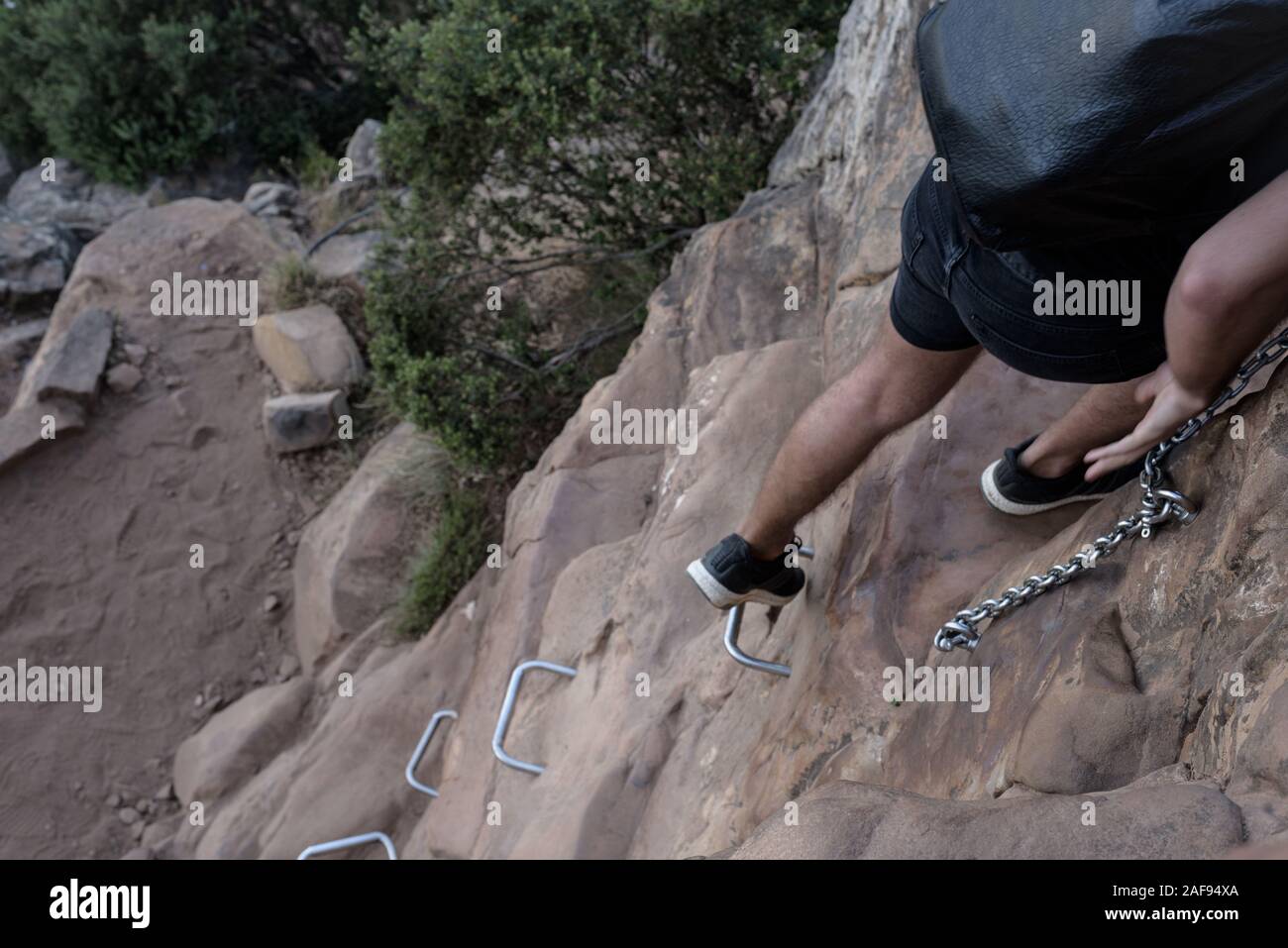 Chains and staples assist hikers climbing the Lion's Head mountain