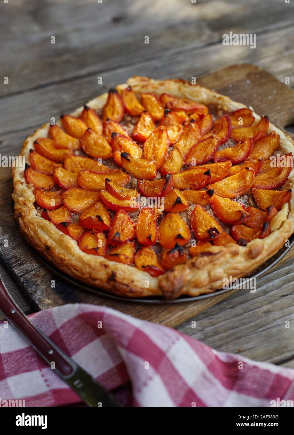 Delicious Apricot almond cake on puff pastry. Stock Photo
