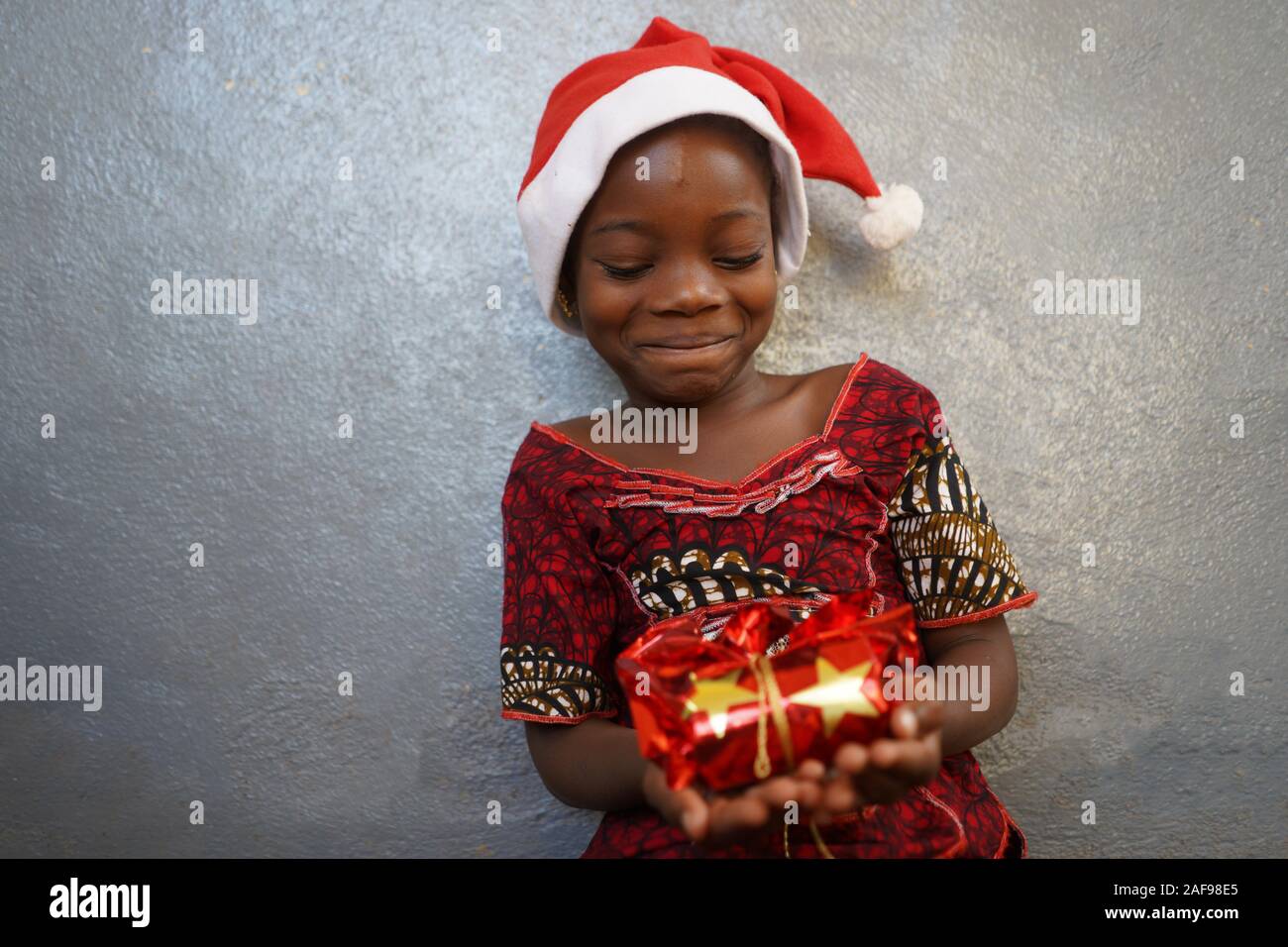 Christmas Gift for African Black Young Women Stock Photo