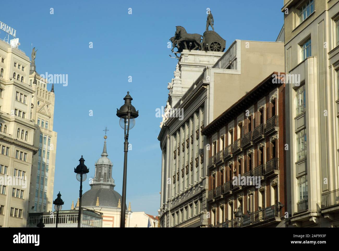Facades of houses and apartments in the winter sun, Madrid, Spain Stock Photo
