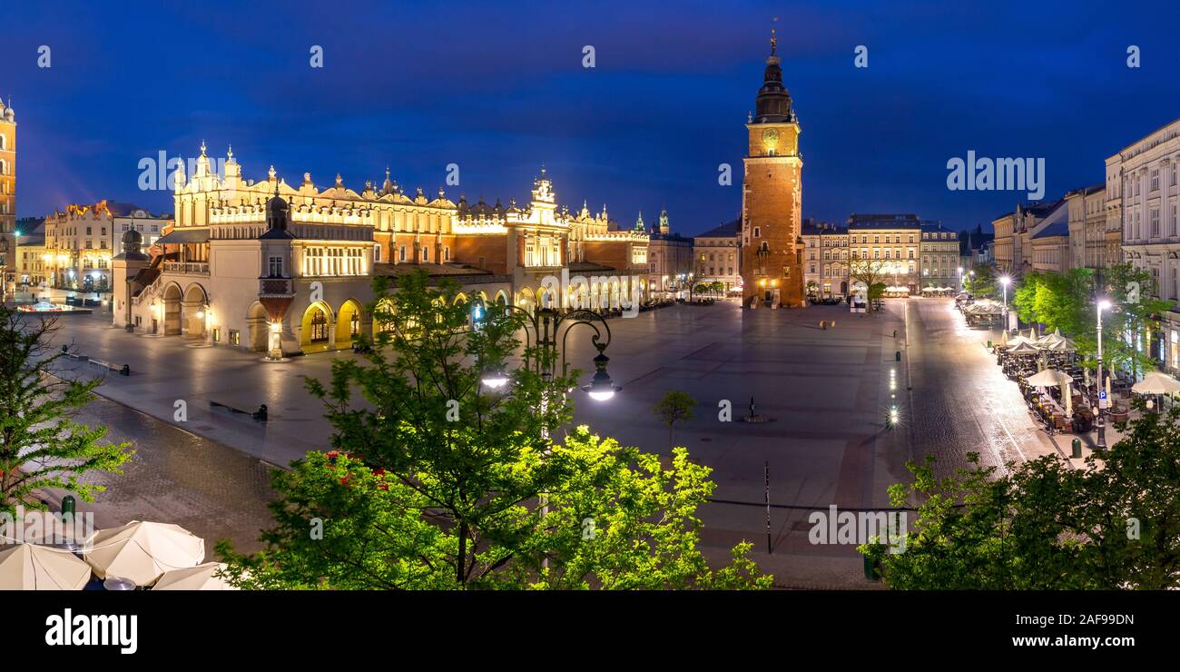 Aerial panorama of Medieval Main market square with Cloth Hall and Town Hall Tower in Old Town of Krakow at night, Poland Stock Photo