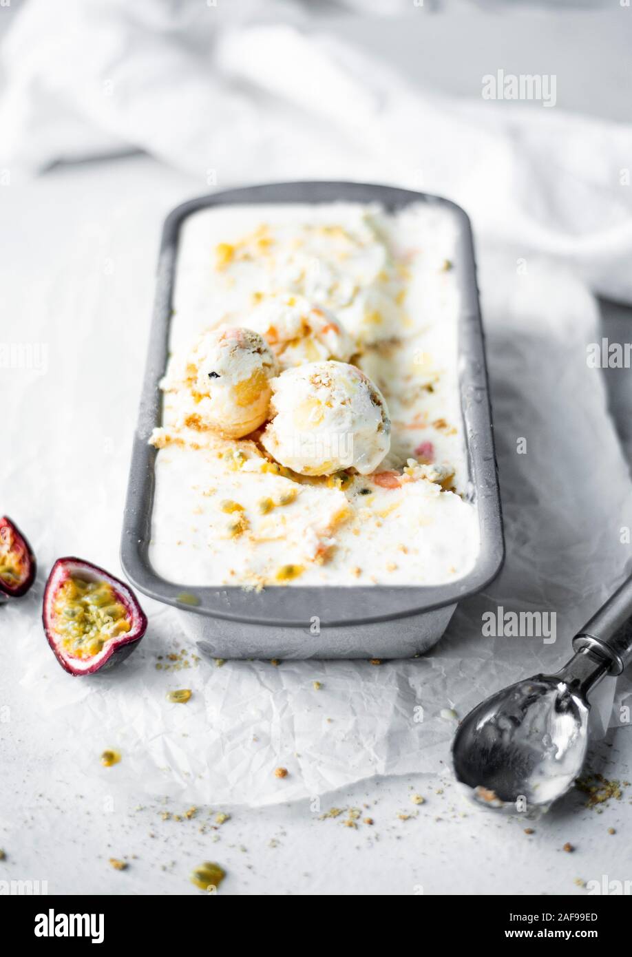 Mango Passion Fruit And Papaya Tropical Cheesecake Ice Cream Stock Photo Alamy