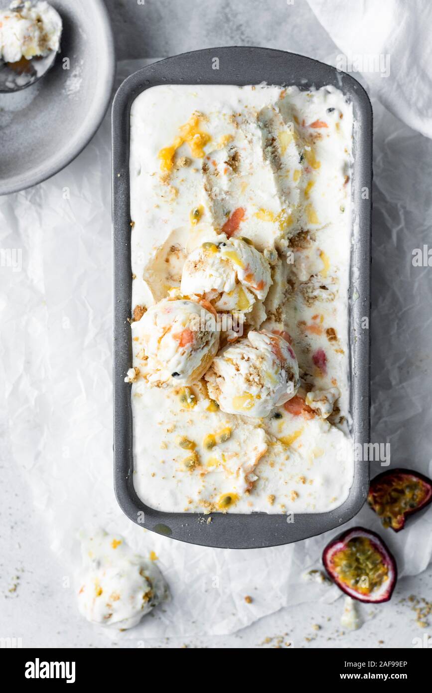 Mango Passion Fruit And Papaya Tropical Cheesecake Ice Cream Stock Photo Alamy