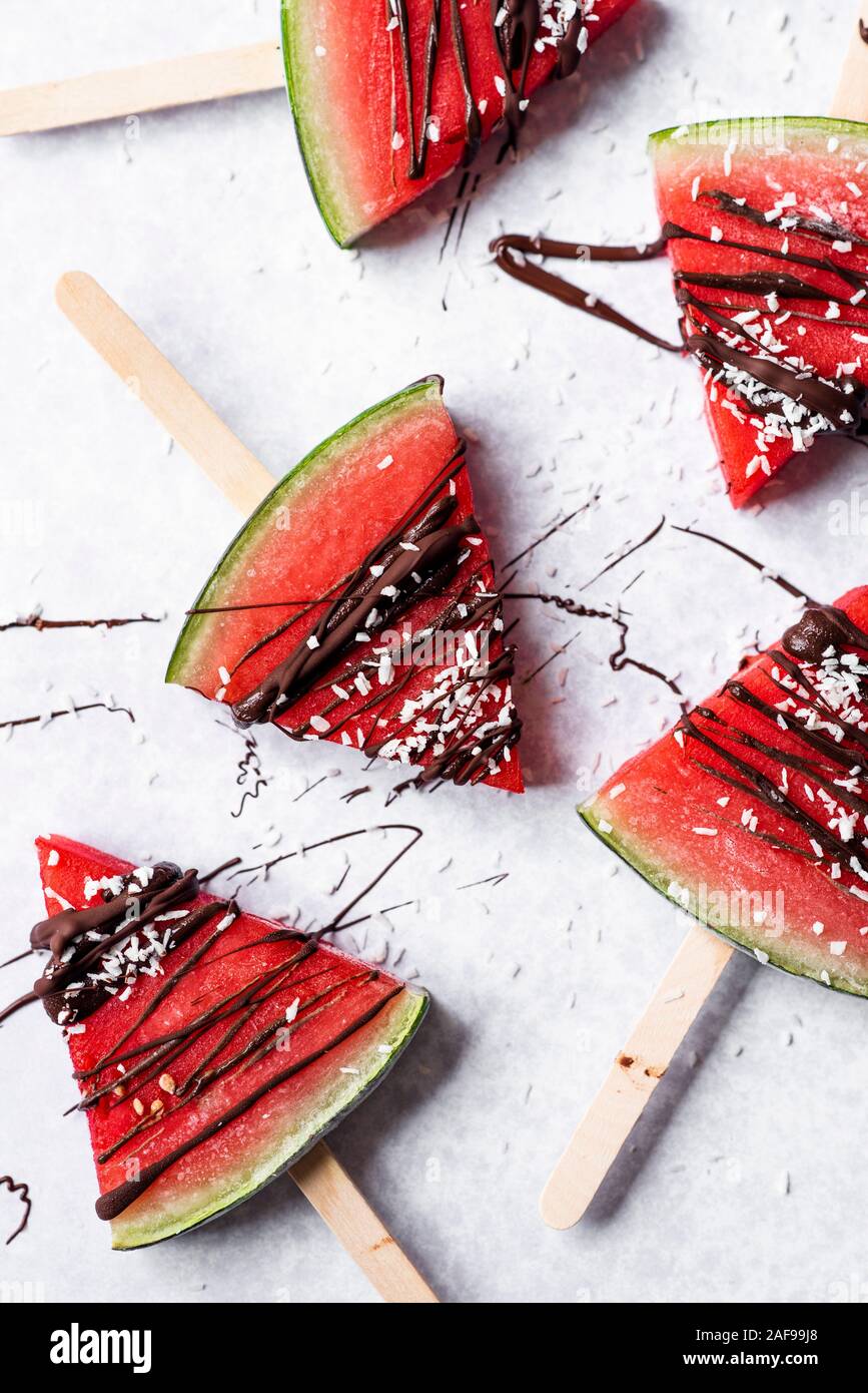 Watermelon Popsicles Drizzled In Milk Chocolate And Sprinkled WIth