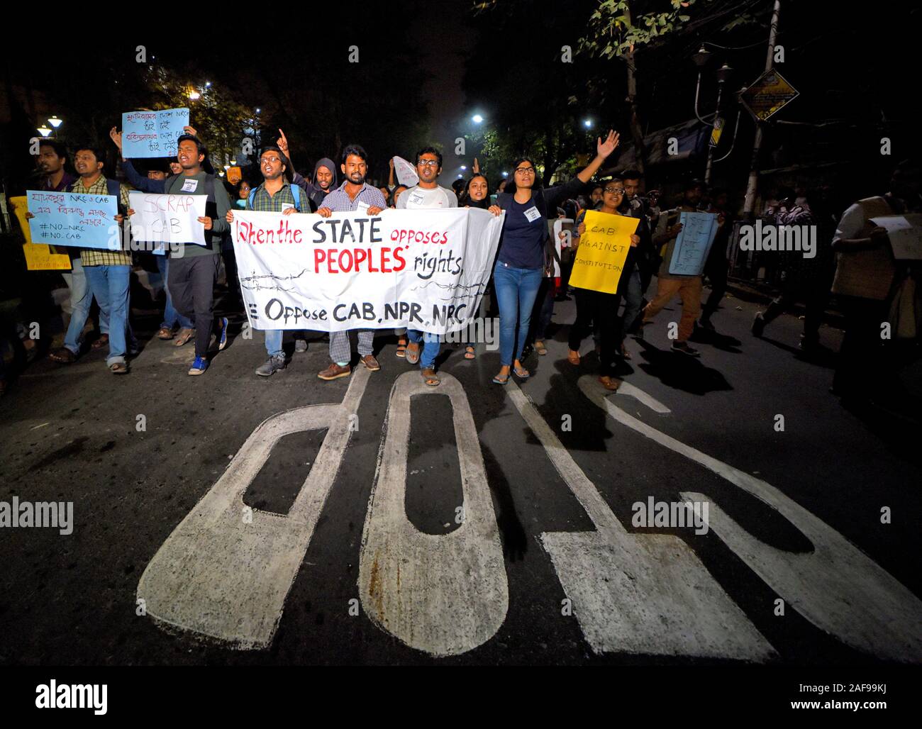 Students Of Jadavpur University Hold A Banner And Placards During