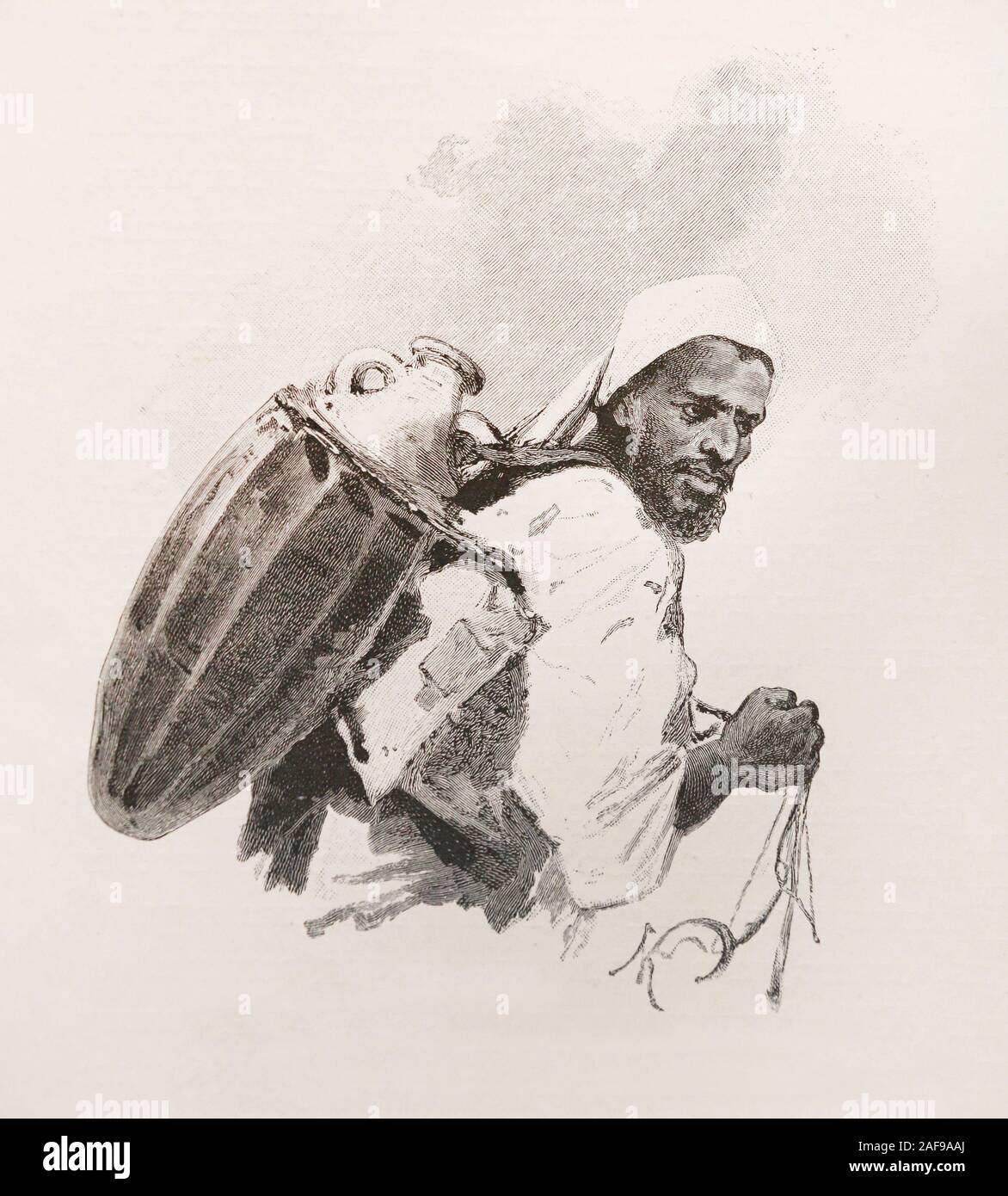 Water carrier in Egypt. Engraving of the 19th century. Stock Photo