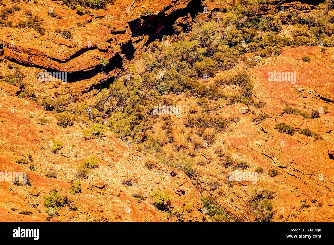 Aerial view of Kings Canyon and the surrounding George Gill Ranges in the remote Northern Territory within central Australia. Stock Photo