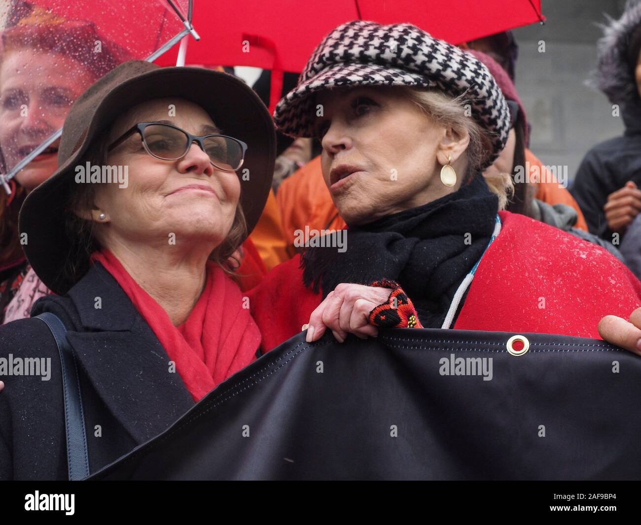 Washington, District of Columbia, USA. 13th Dec, 2019. Sally Fields and Jane Fonda stand on the steps of the US Capitol during the Fire Drill Friday rally, with the demand for a Green New Deal.The event focused on the need for a 'Just Transition' from our fossil fuel-based economy to one based on clean, renewable energy sources. Credit: Sue Dorfman/ZUMA Wire/Alamy Live News Stock Photo