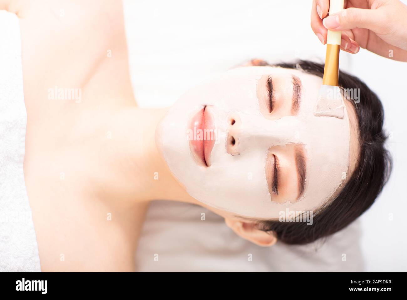 Pretty woman face mask hi-res stock photography and images - Alamy
