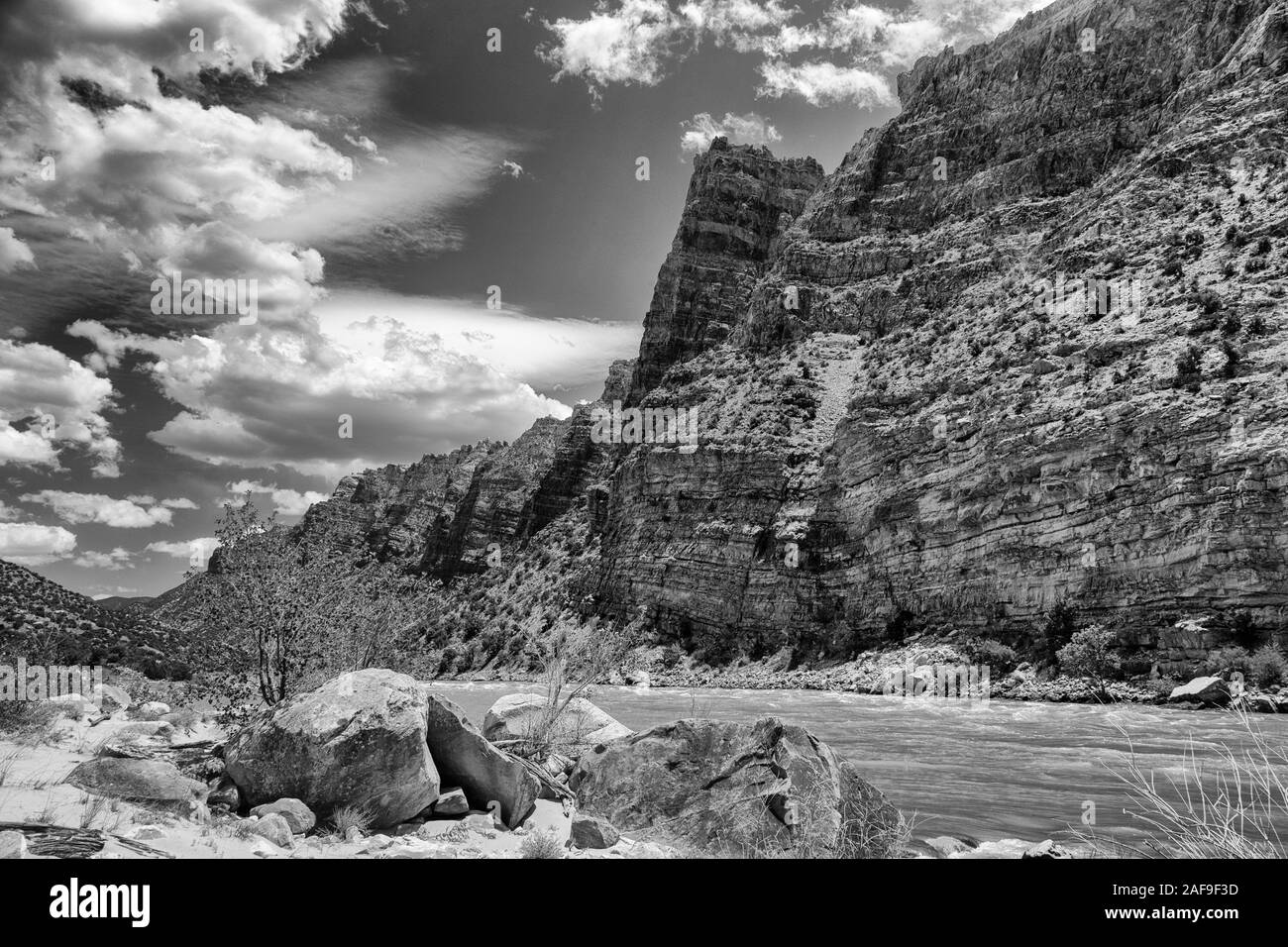 A black and white image of the rock formations and cliffs of Split Mountain Canyon on the Green River in Dinosaur National Monument in northern Utah. Stock Photo