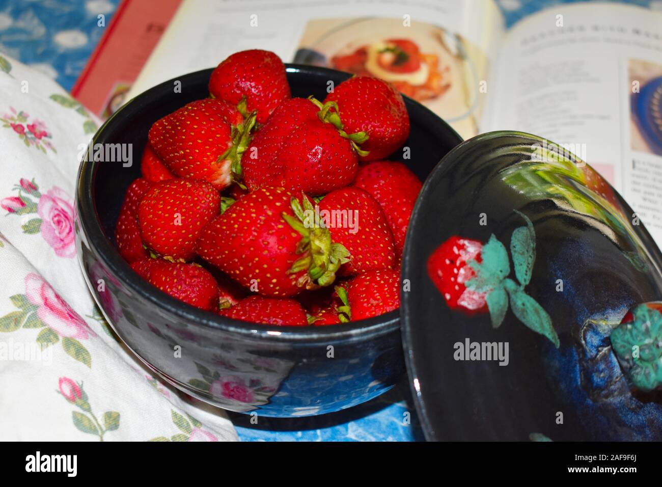 Delicious Strawberries in Decorative Ceramic Bowl Stock Photo