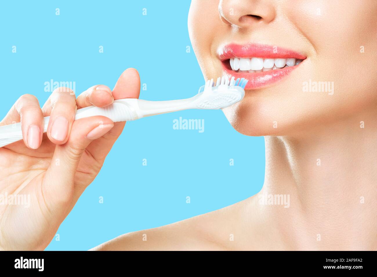 White Teeth with toothbrush. Dental health background Stock Photo