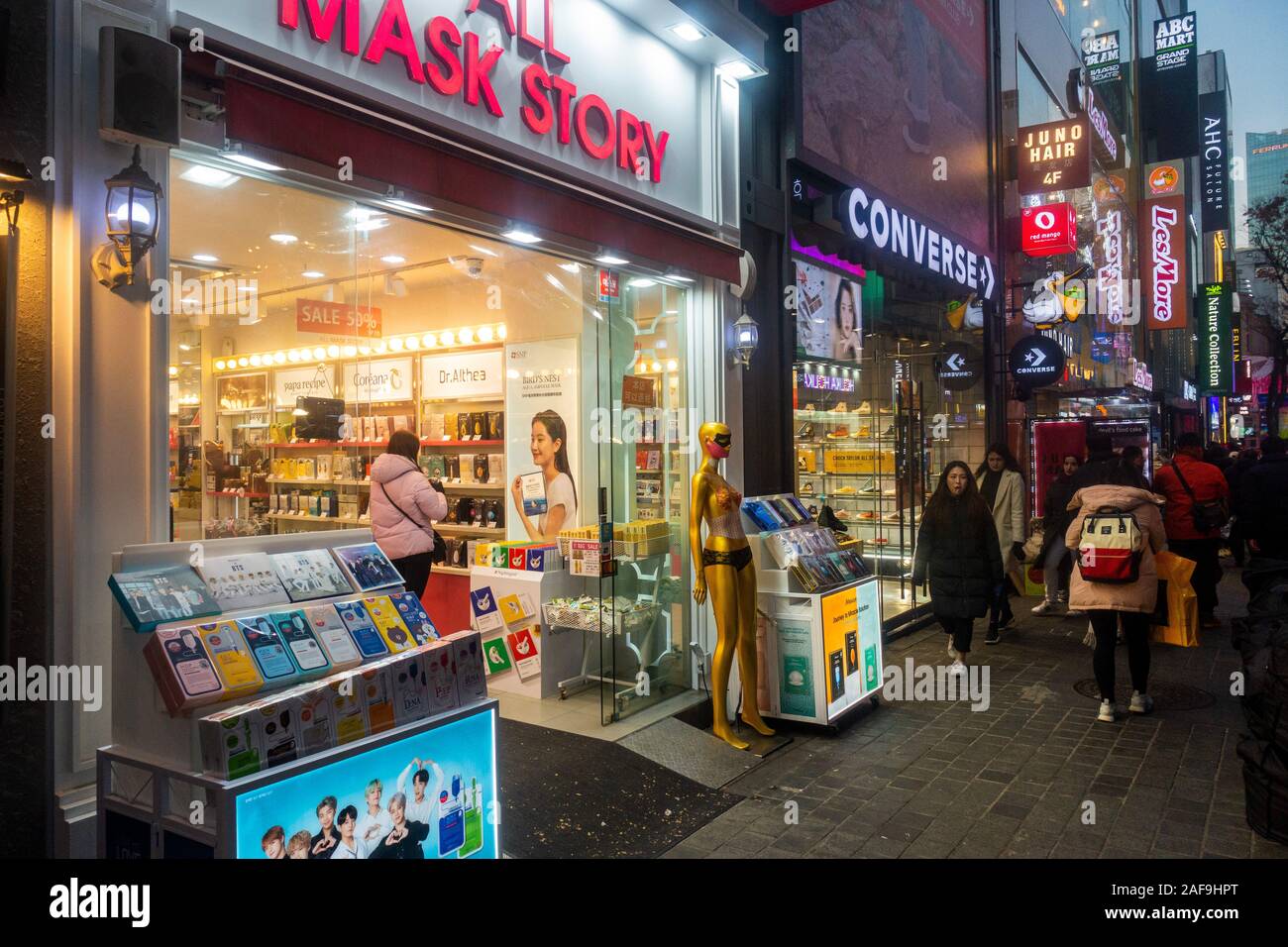 Seoul, South Korea - December 6th, 2019: Myeongdong district at evening, popular site for cosmetic and beauty shops and street food. Stock Photo