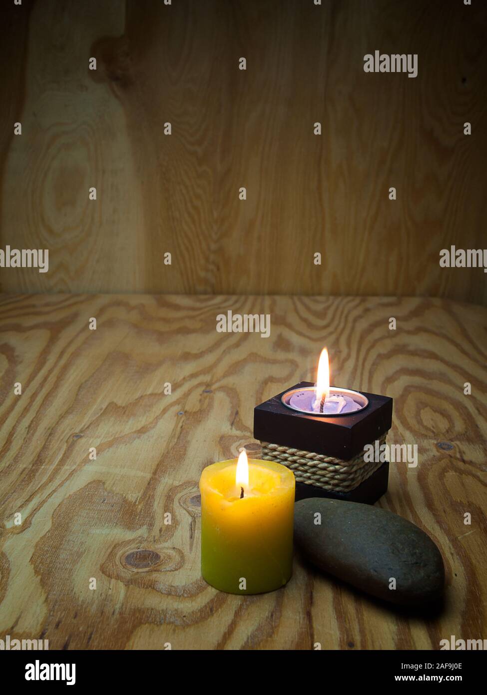 Candle with Warm Atmosphere,Lights Background. Stock Photo