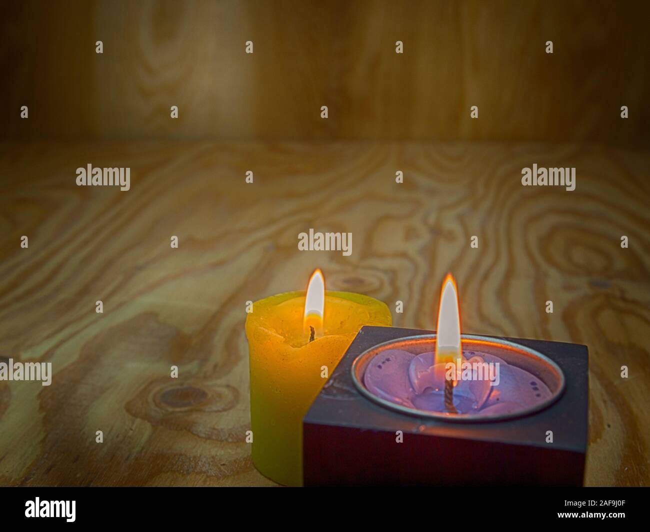 Close up Candle with Warm Atmosphere,Lights  Background. (Analog Efex) Stock Photo