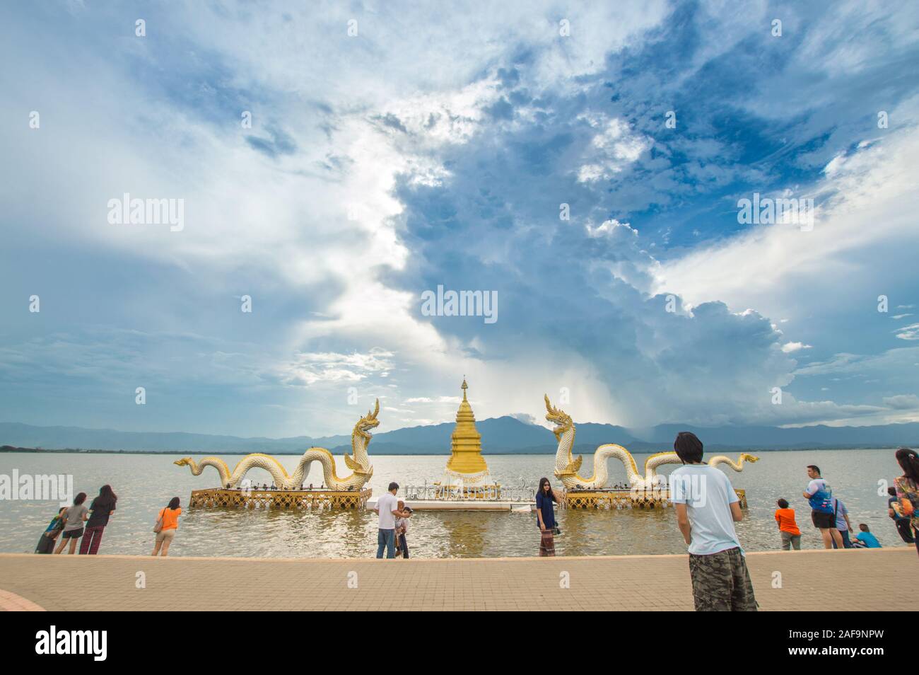 Phayao, Thailand - October 13, 2019: The Naga statue in Phayao lake (Kwan Phayao) with blue sky background. Stock Photo