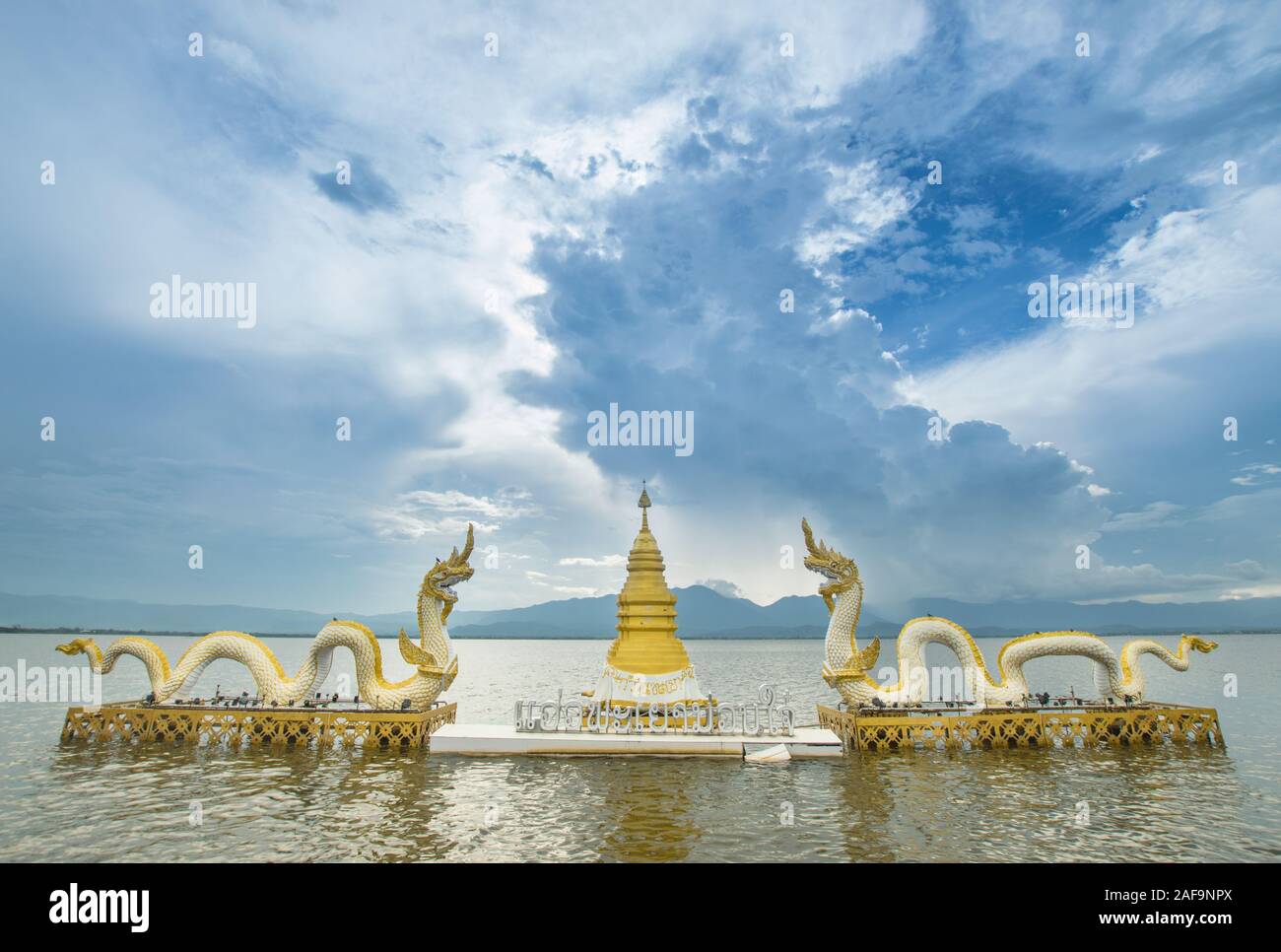 Phayao, Thailand - October 13, 2019: The Naga statue in Phayao lake (Kwan Phayao) with blue sky background. Stock Photo