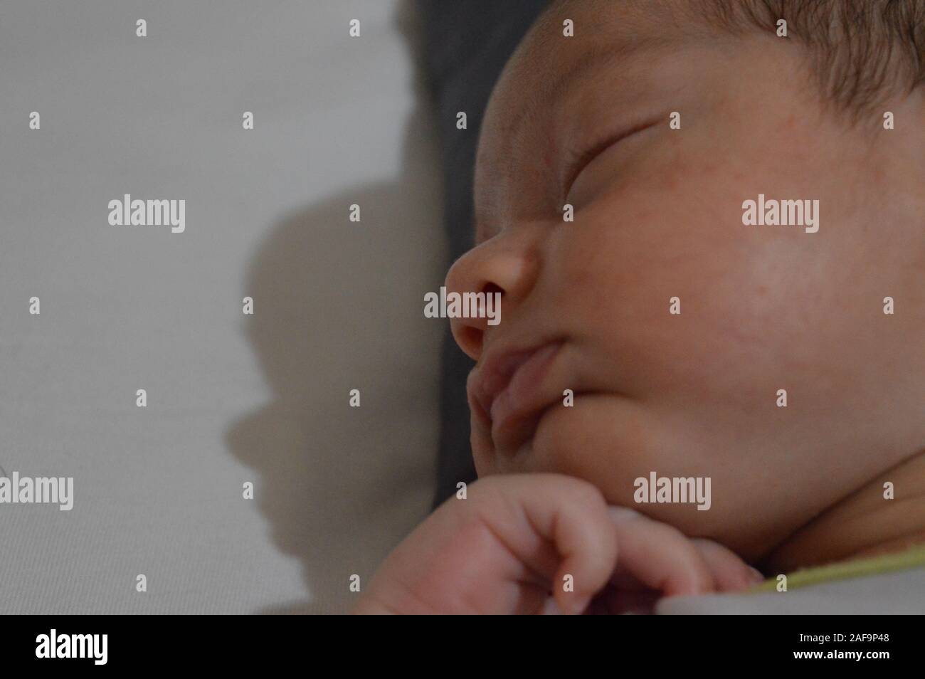 sleepy new born baby in dream Stock Photo Alamy