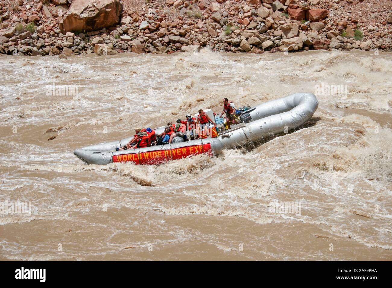 A 33' Srig raft navigates through the Big Drop II rapid in Cataract
