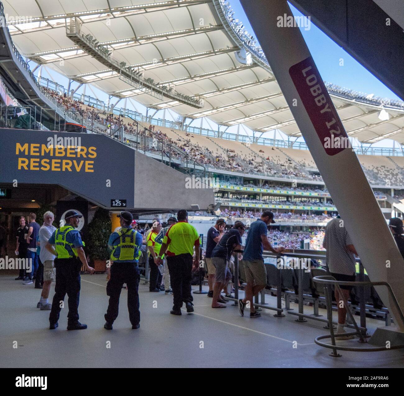 Police and security guard near the WACA members enclosure at Optus Stadium during Australia New Zealand Cricket test match Perth Western Australia. Stock Photo