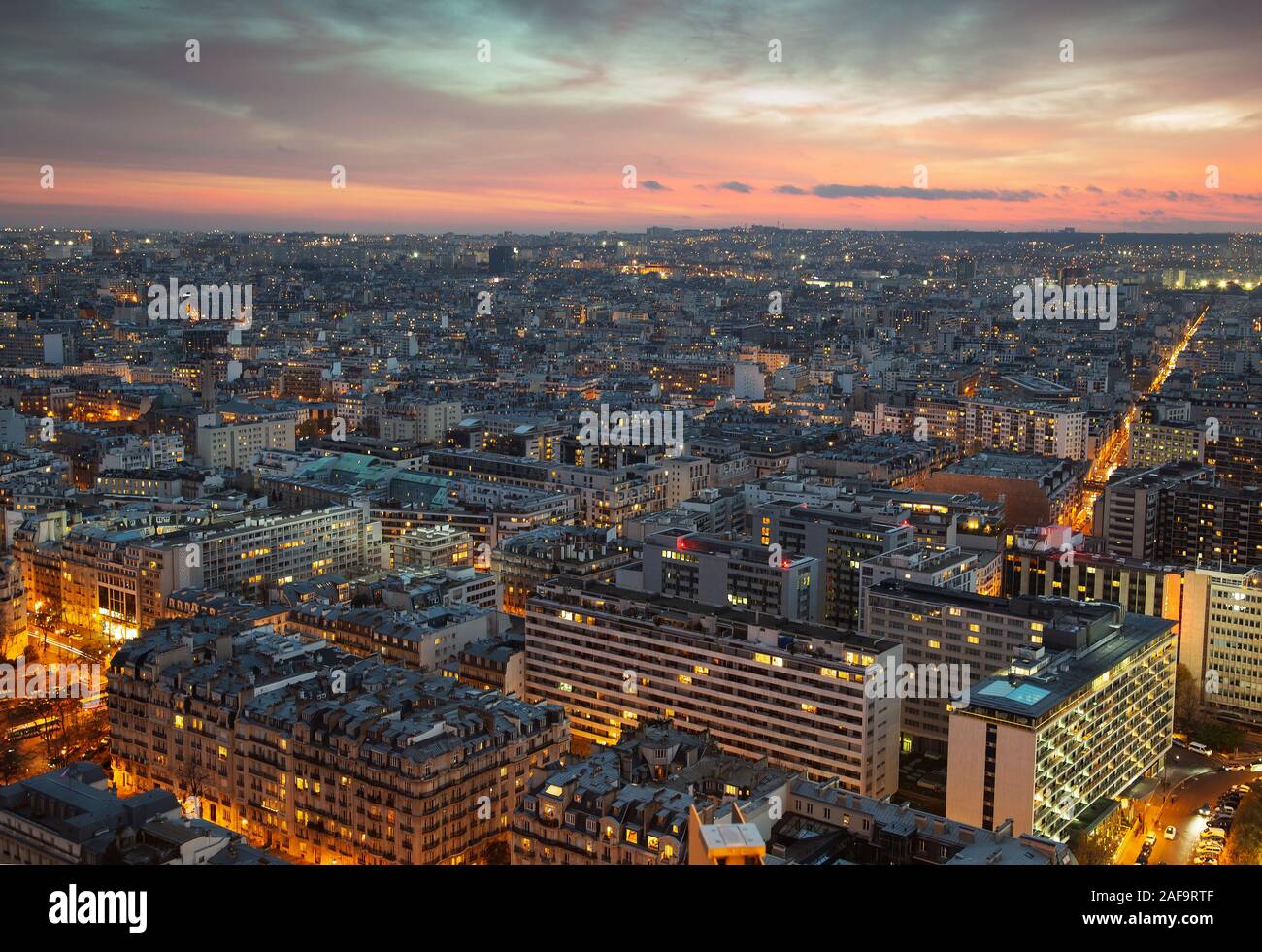 Paris city seen from Eiffel tower after sunset Stock Photo