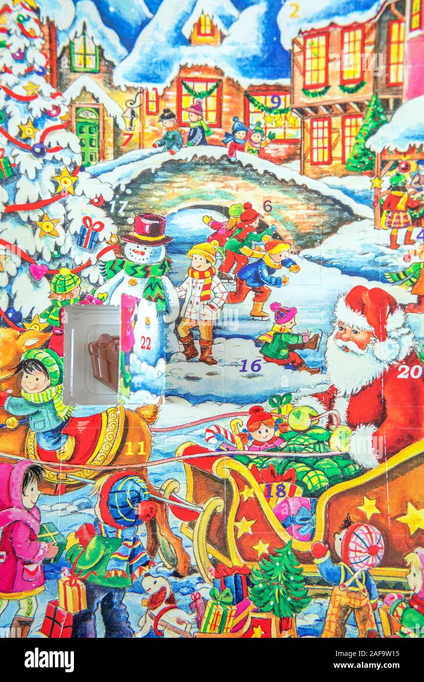 Christmas advent calendar with Santa and many children Stock Photo