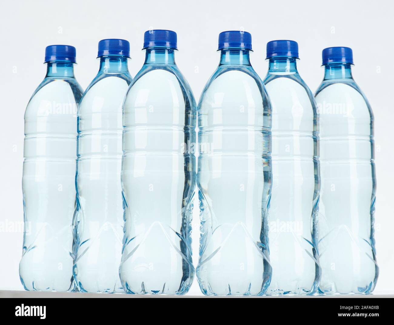 Group of plastic bottles isolated on white background Stock Photo