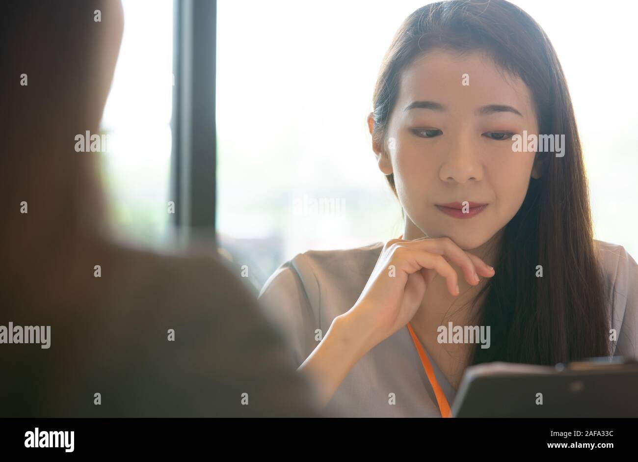 young asian woman Interviewer. Hiring employee concept. Stock Photo